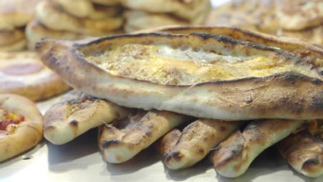 delicious turkish pide flatbreads with cheese and egg topping