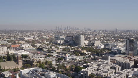 Flying-over-downtown-Hollywood-with-downtown-Los-Angeles-in-the-distance