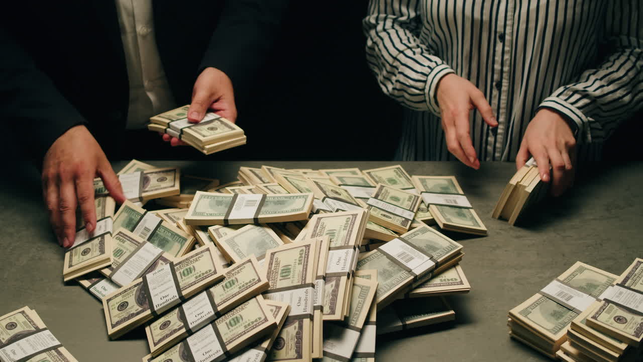 Specialised police officer Counting dollar banknotes in crime lab, conceptual image. High quality 4k footage