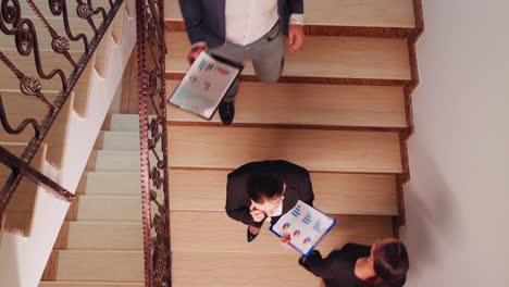 Top-view-of-woman-company-manager-talking-on-phone