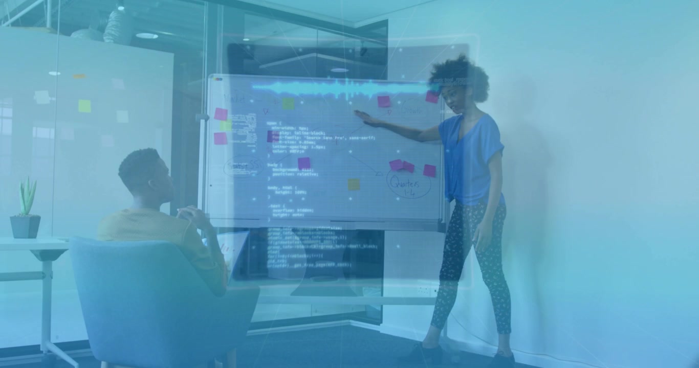 Female presenter gesturing at whiteboard and activating pulsing tech overlays for visualization