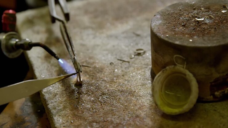 Jewelry designer working in workshop 4k