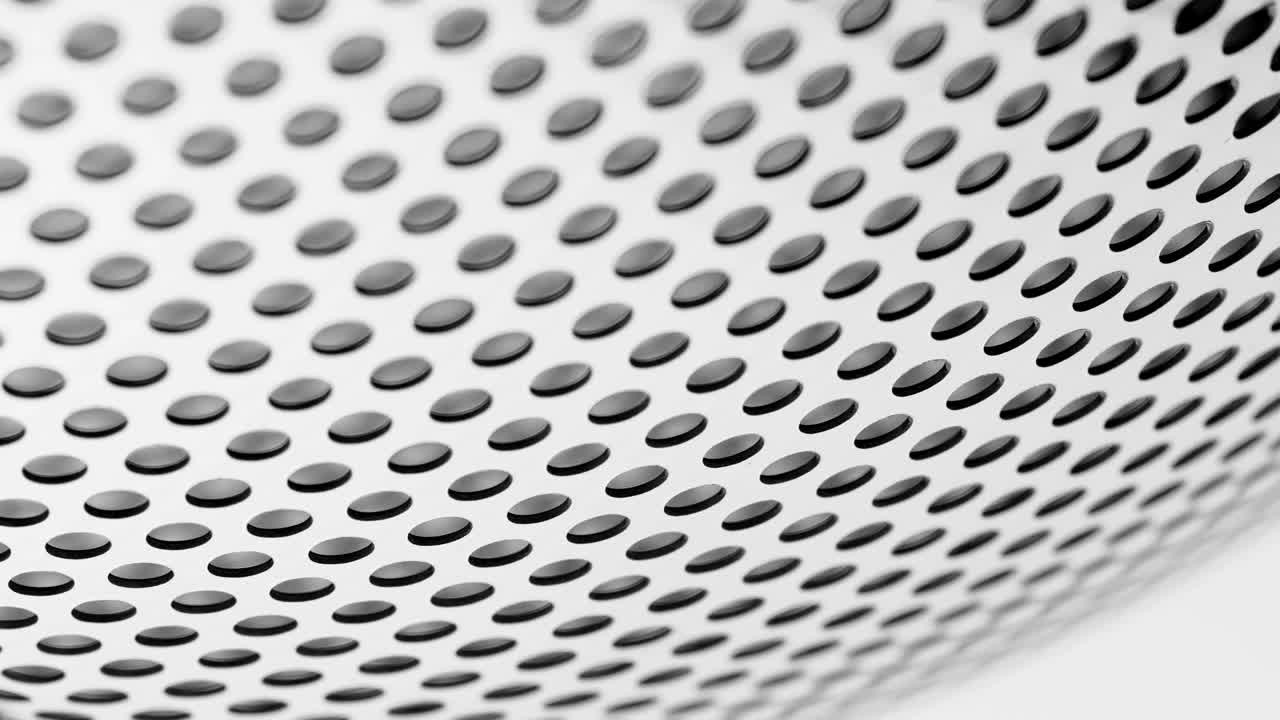 fondo con agujeros perforados.