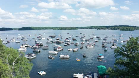 aerial, boats crowded on a lake during spring summer break