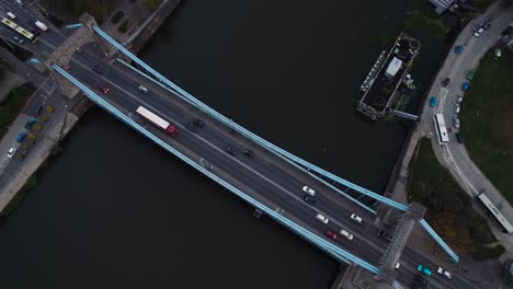 vehicles crossing wroclaw's grunwald sophisticated multi-lane bridge. aerial