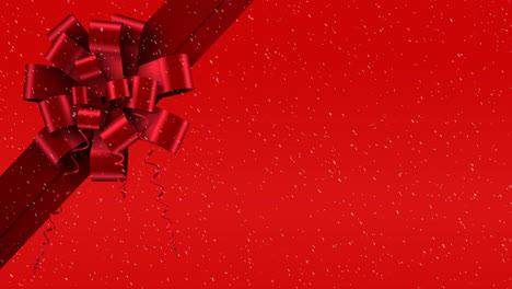 animation of snow falling against christmas present ribbon on red