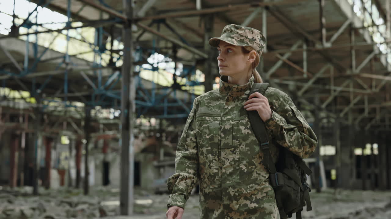 Woman Soldier in Abandoned Factory