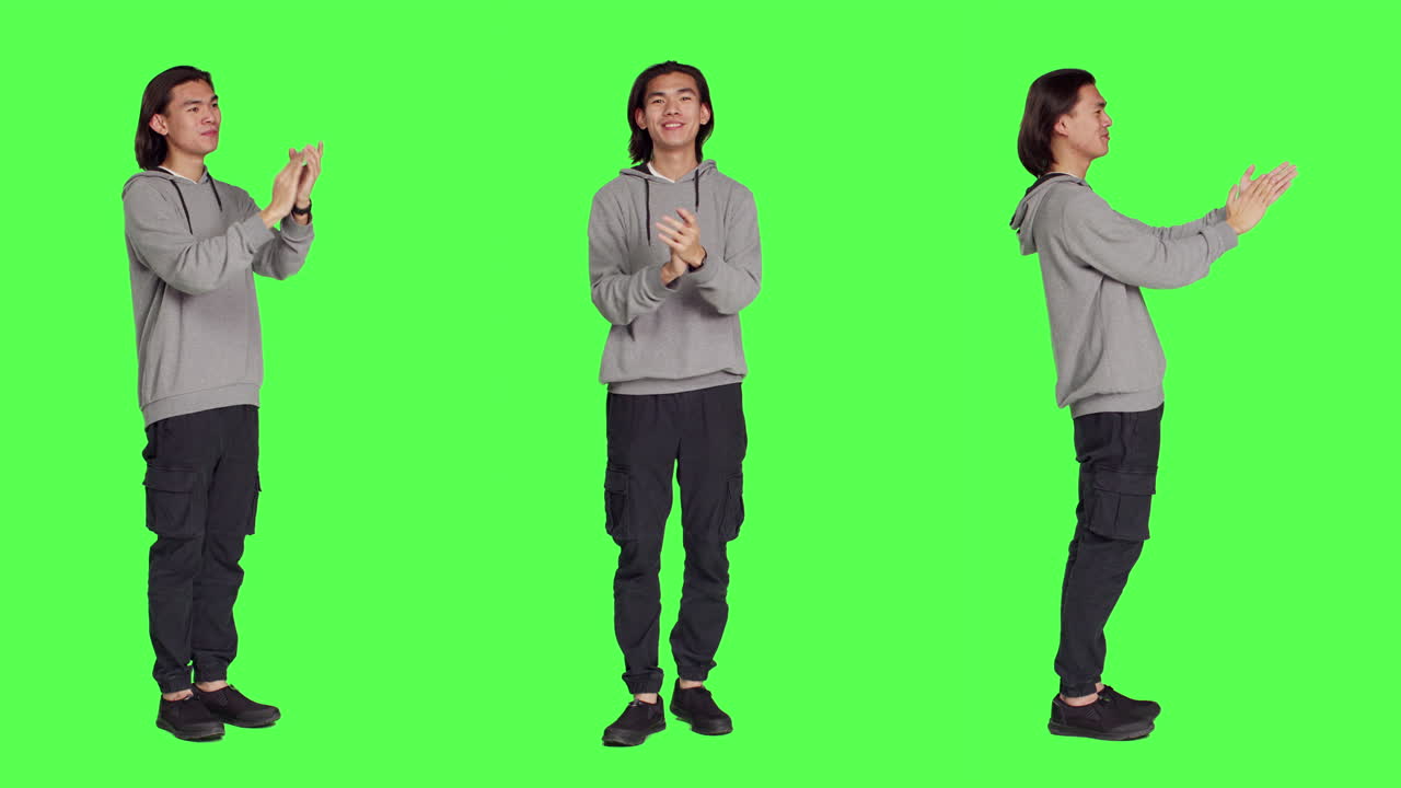 행복 한 아시아인 남자 가 한 사람 에게 박수 를 치고 있다