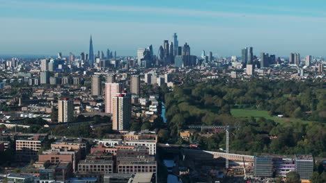 descending aerial shot over hertford union canal and victoria park towards central london