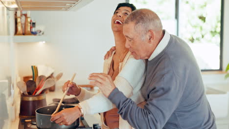 Food,-laughing-and-a-senior-couple-in-the-kitchen