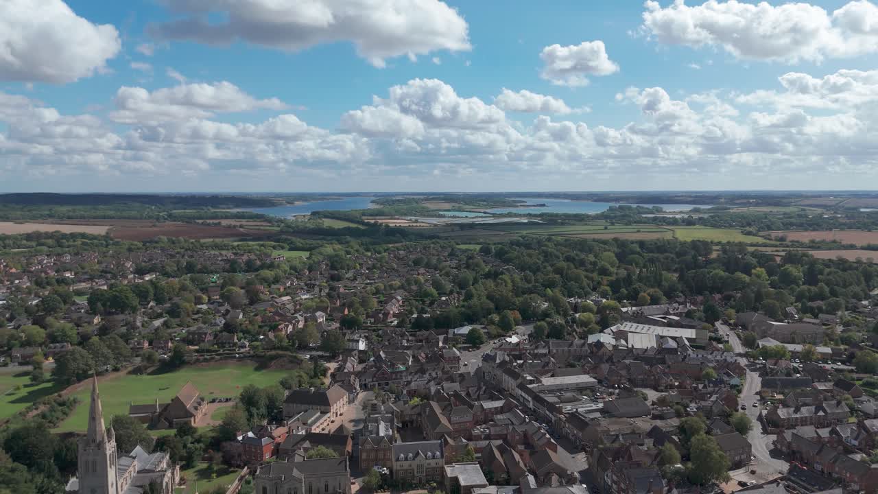Aerial view of Oakham, Rutland, under a sunny sky with scattered clouds