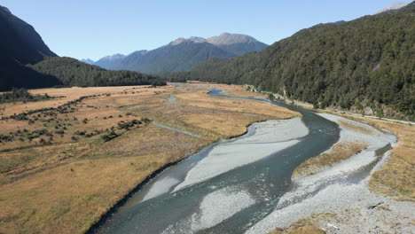 aerial high flying drone footage of eglinton river, new zealand