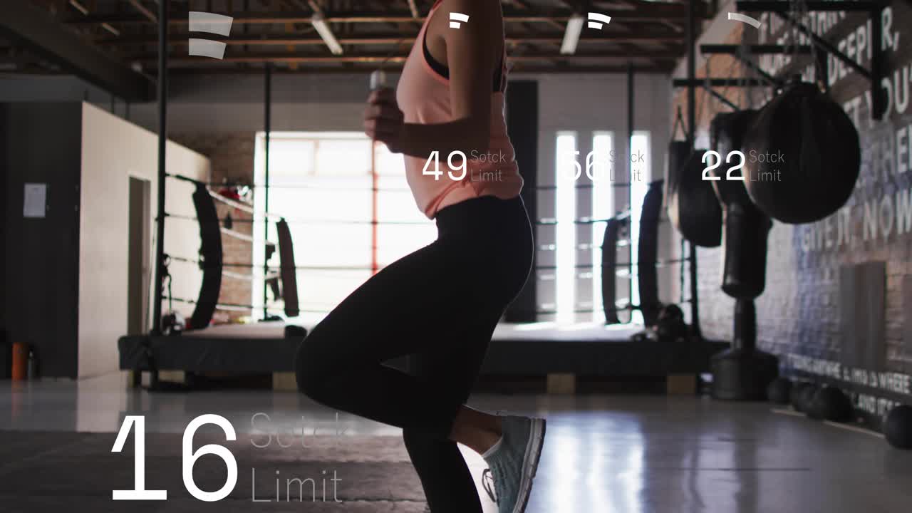 Female exerciser performing hops in gym, each hop updating HUD, varying metrics and counting reps