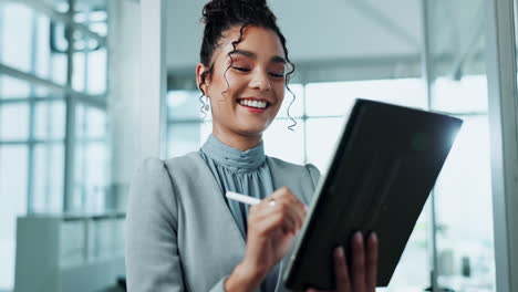 businesswoman working on tablet in office