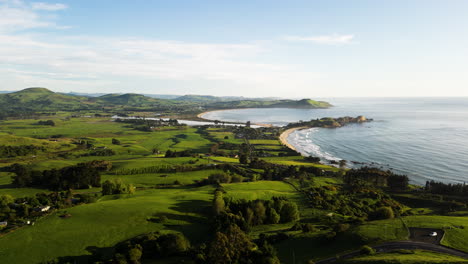 Hilly-terrain-and-sandy-beaches-of-New-Zealand,-aerial-drone-view