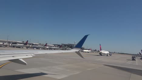 AIRPLANE-TAXING-ON-TARMAC--BEFORE-TAKE-OFF