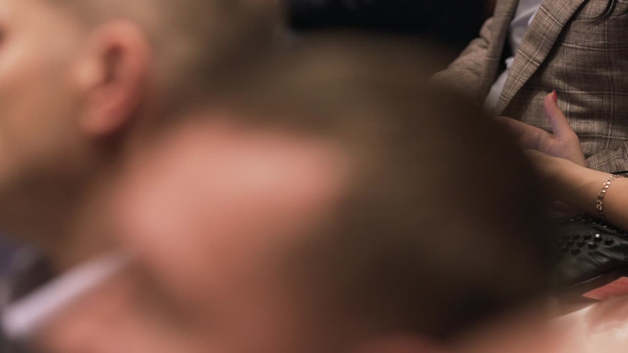 People using smartphones at a conference