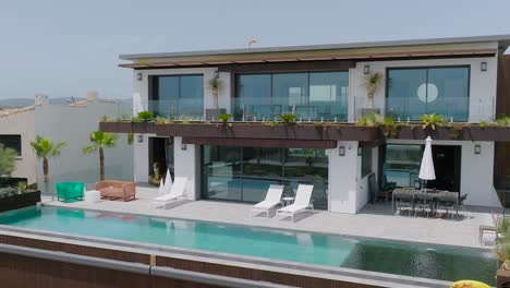 aerial shot of the stunning private pool at the back of a seafront villa in frontignan