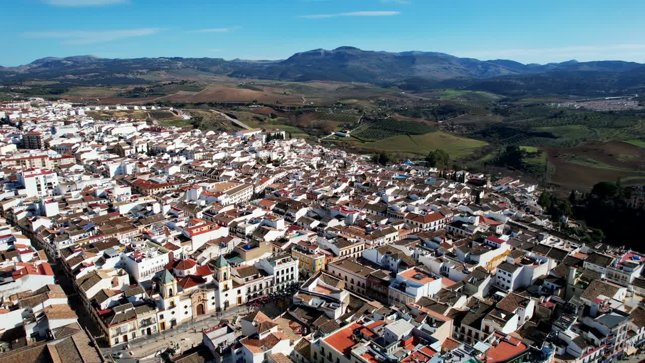 Aerial pan across amazing city of Ronda Spain in broad daylight