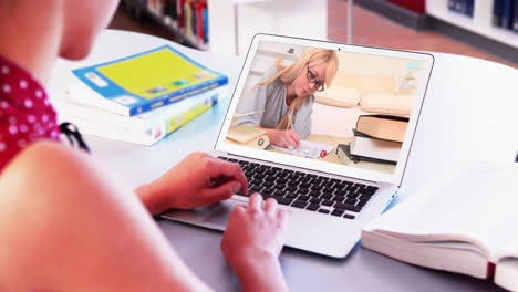 Caucasian-female-teacher-using-laptop-on-video-call-with-female-student