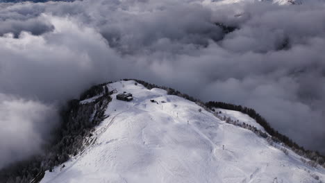 aerial shot in switzerland over the town of crans montana, valais
