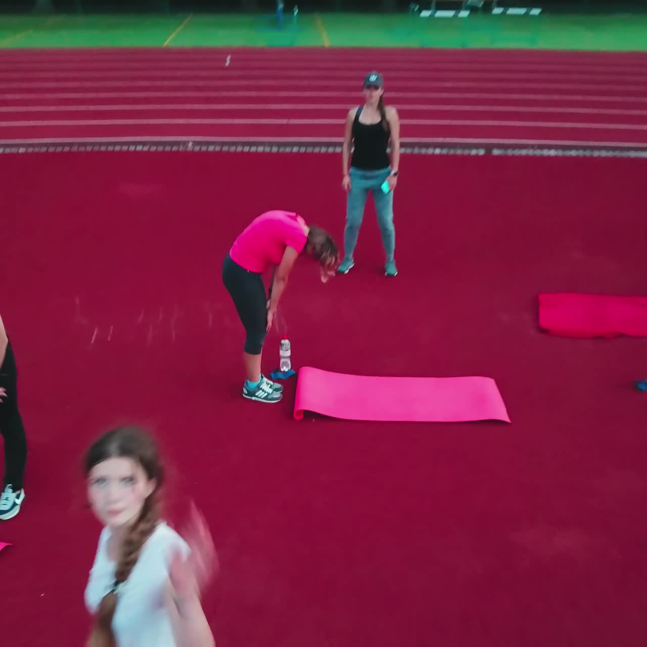 Athletic group training on stadium