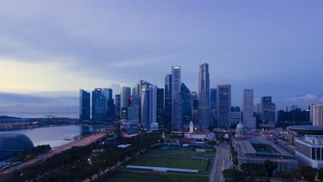 time-lapse of view overlooking the padang and singapore skyline