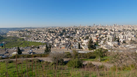 highway bends along outskirts of jerusalem israel on a sunny blue sky day