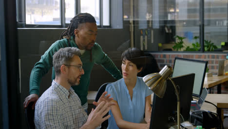 business people discussing over computer in office 4k