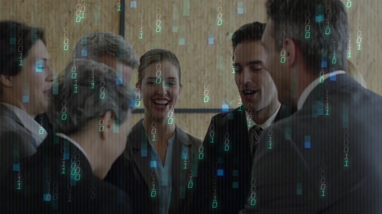 team of business professionals standing in office area, displaying floating binary code graphics