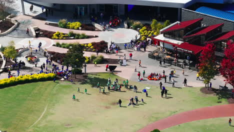 aerial view of groups of children spending time in public park