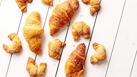 various croissants lying on table