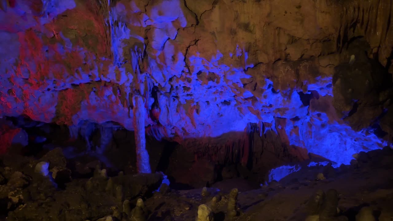 Cave ceiling illuminated with bluish-purple light. Florida Caverns State Park. Zoom in
