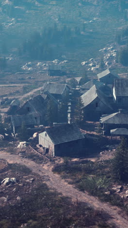 medieval fantasy village in foggy mountains