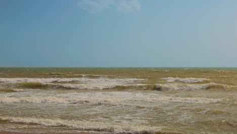 Empty-beach-waves-of-Calahonda,-Spain,-after-a-storm