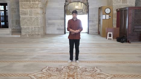 man pray on mosque