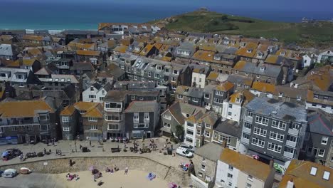 Aerial:-St-Ives-coastal-town-in-Cornwall,-popular-tourist-destination-in-UK