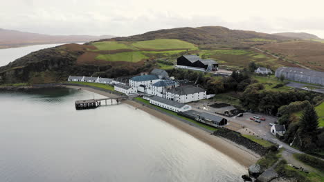 whisky distillery aerial bunnahabhain from sound of islay