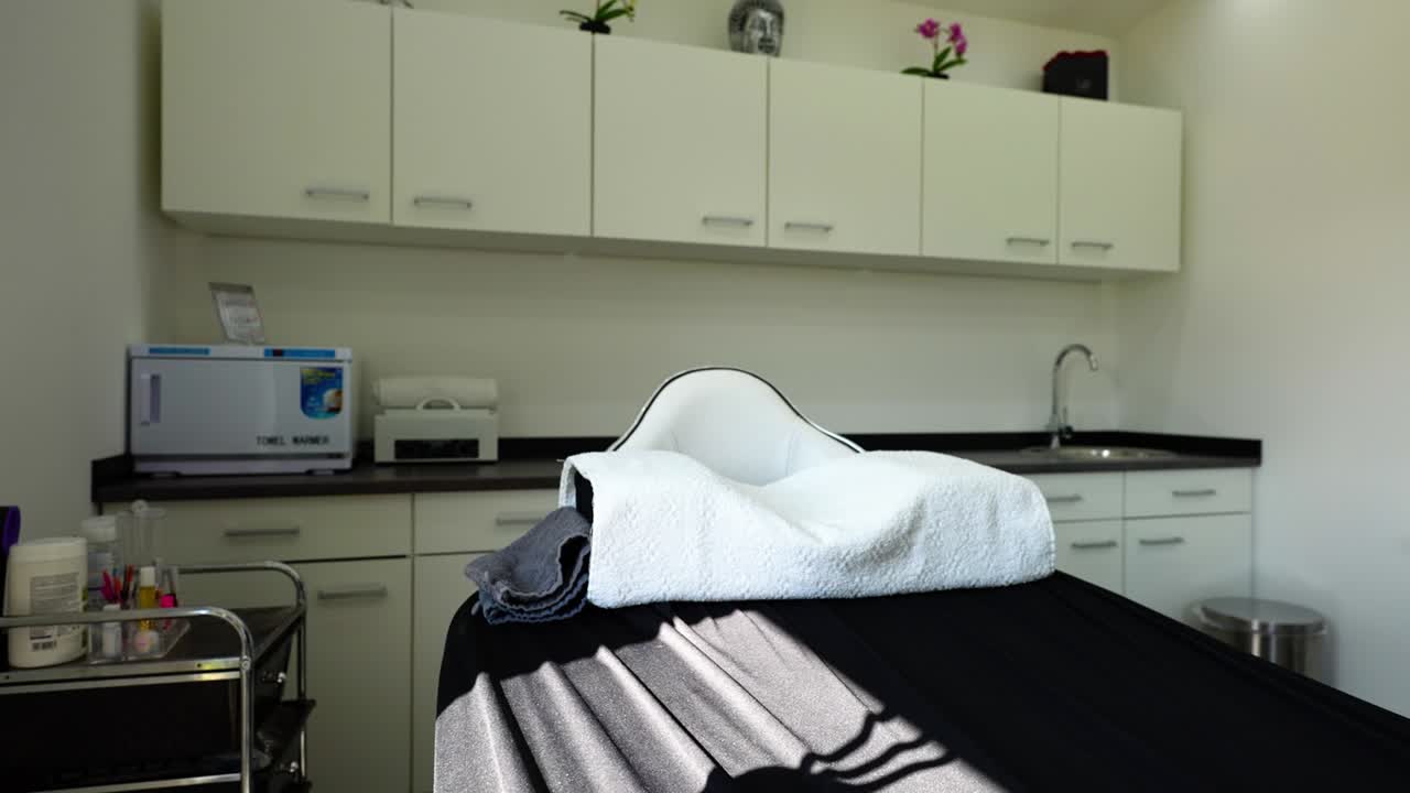 Calm and Inviting Spa Treatment Room Prepared for a Relaxing Facial Experience