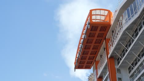 orange lifeboat on a cruise ship