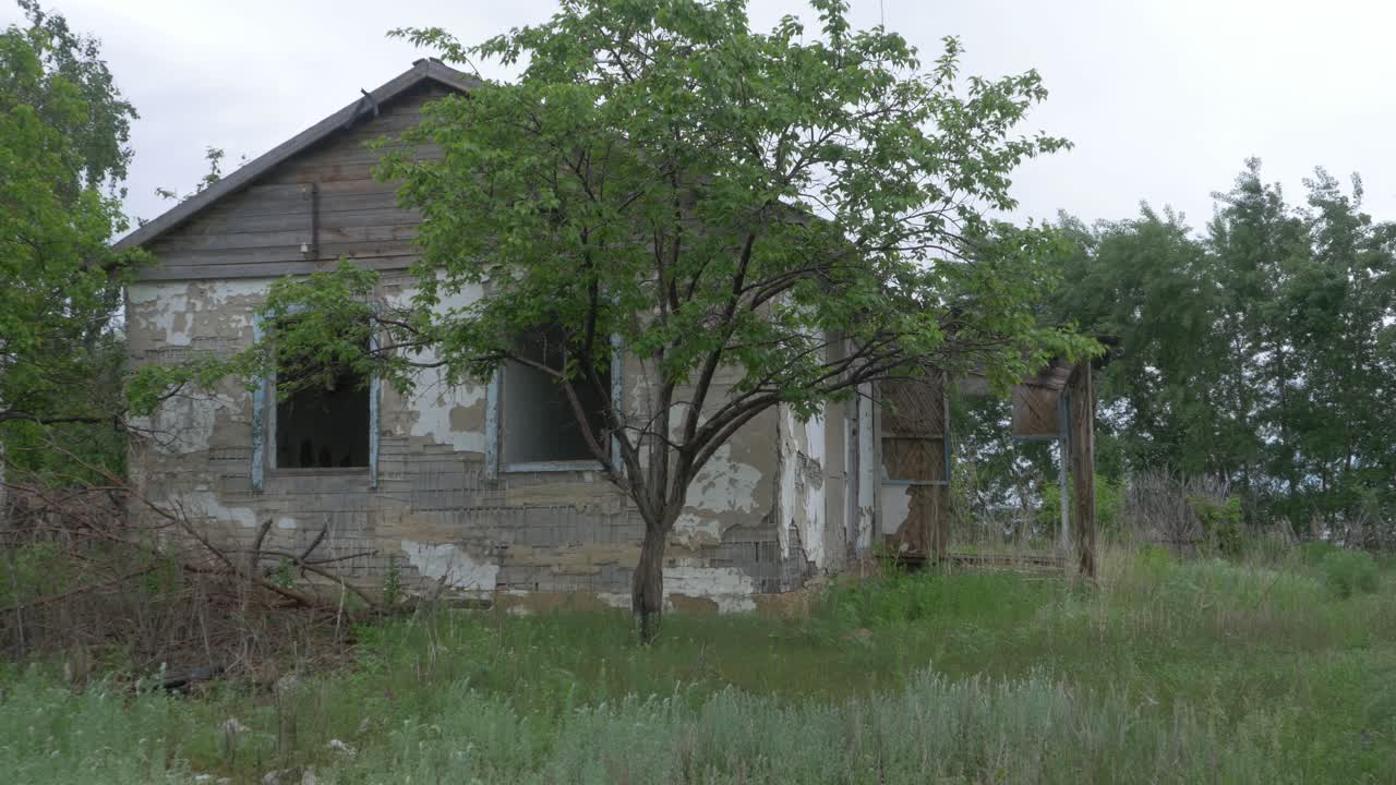 Abandoned rural house in a field