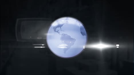 digital animation of spinning globe against spot of light on black background