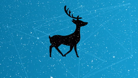 snow falling over silhouette of reindeer walking against network of connections on blue background