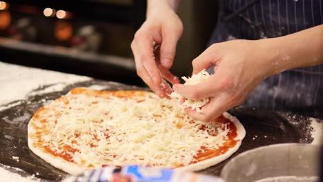 preparing pizza with cheese at krabi market