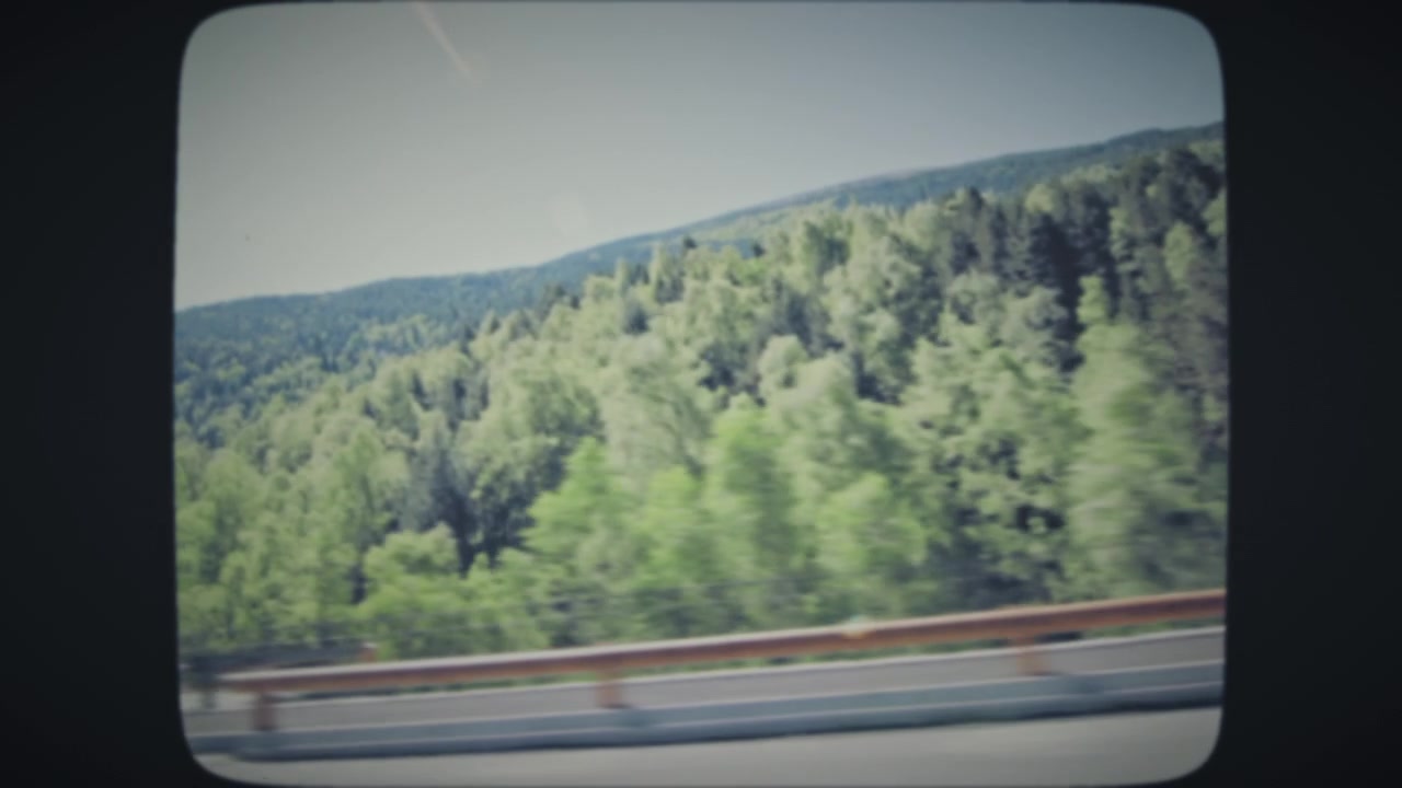 Driving through green hills of Europe