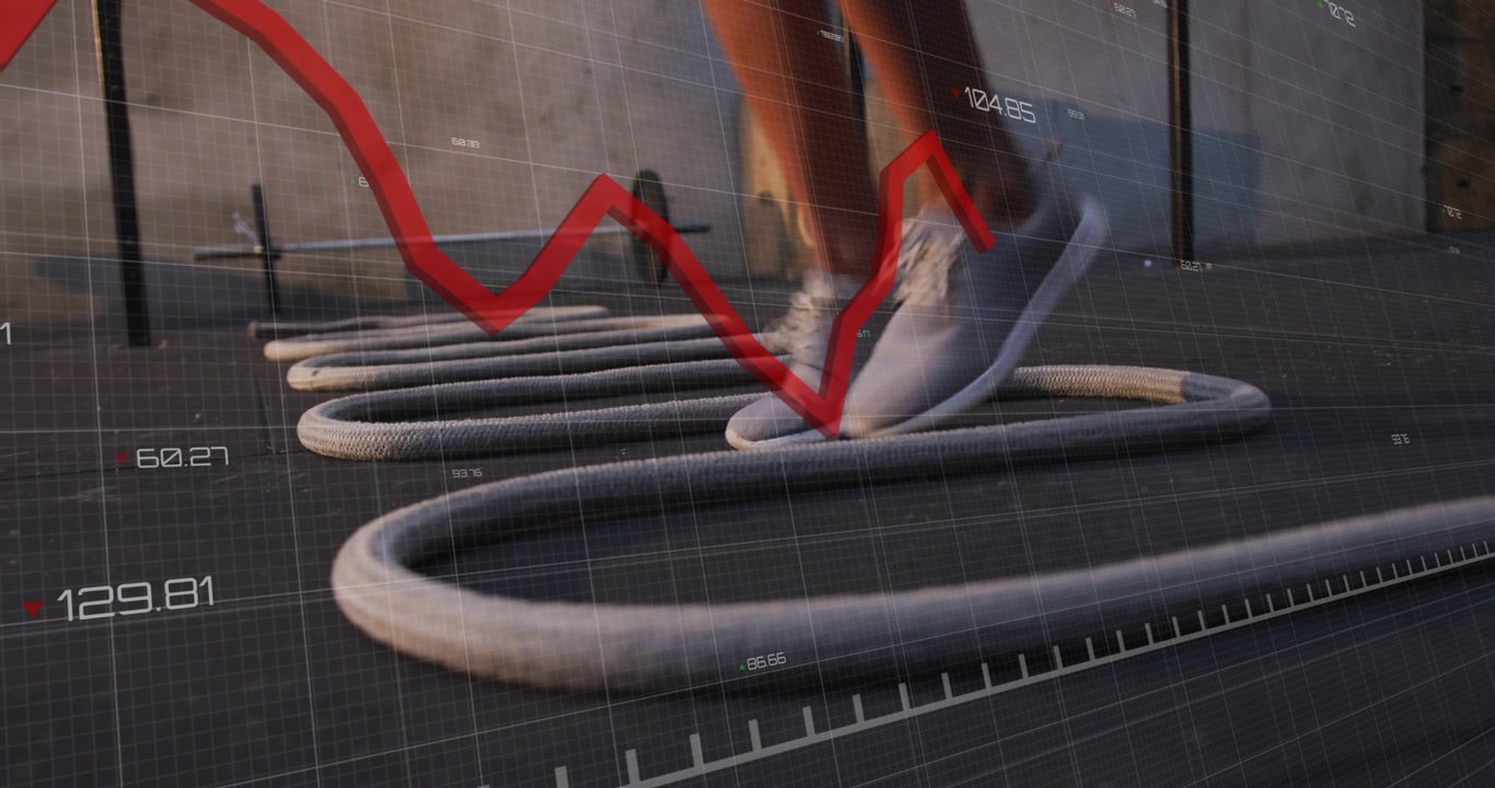 Female athlete shifting weight and doing rope footwork with grid overlay tracking red fitness graph