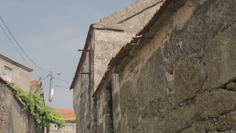 tilt shot of a street in a rural village on a hill friaes tras-os-montes portugal