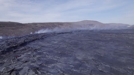 panorama of the steam from the solid magma of fagradalsfjall volcano in natthagi valley in iceland