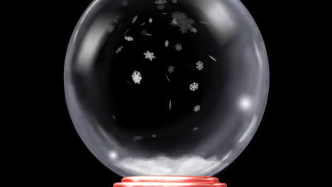animación del globo de nieve de navidad con nieve cayendo sobre un fondo negro