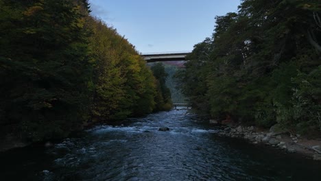 Flying-Over-a-rocky-river,-Patagonia,-Argentina,-South-America